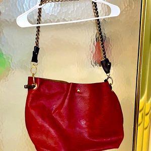 Large women’s red shoulder bag